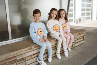 Petite Hailey Multi Smile Sweatshirt - Sky Blue, Petite Hailey, Petite Hailey, Petite Hailey Sweatshirt, Smile, Smiley, Smiley Face, Sweatshirt, Sweatshirt - Basically Bows & Bowties